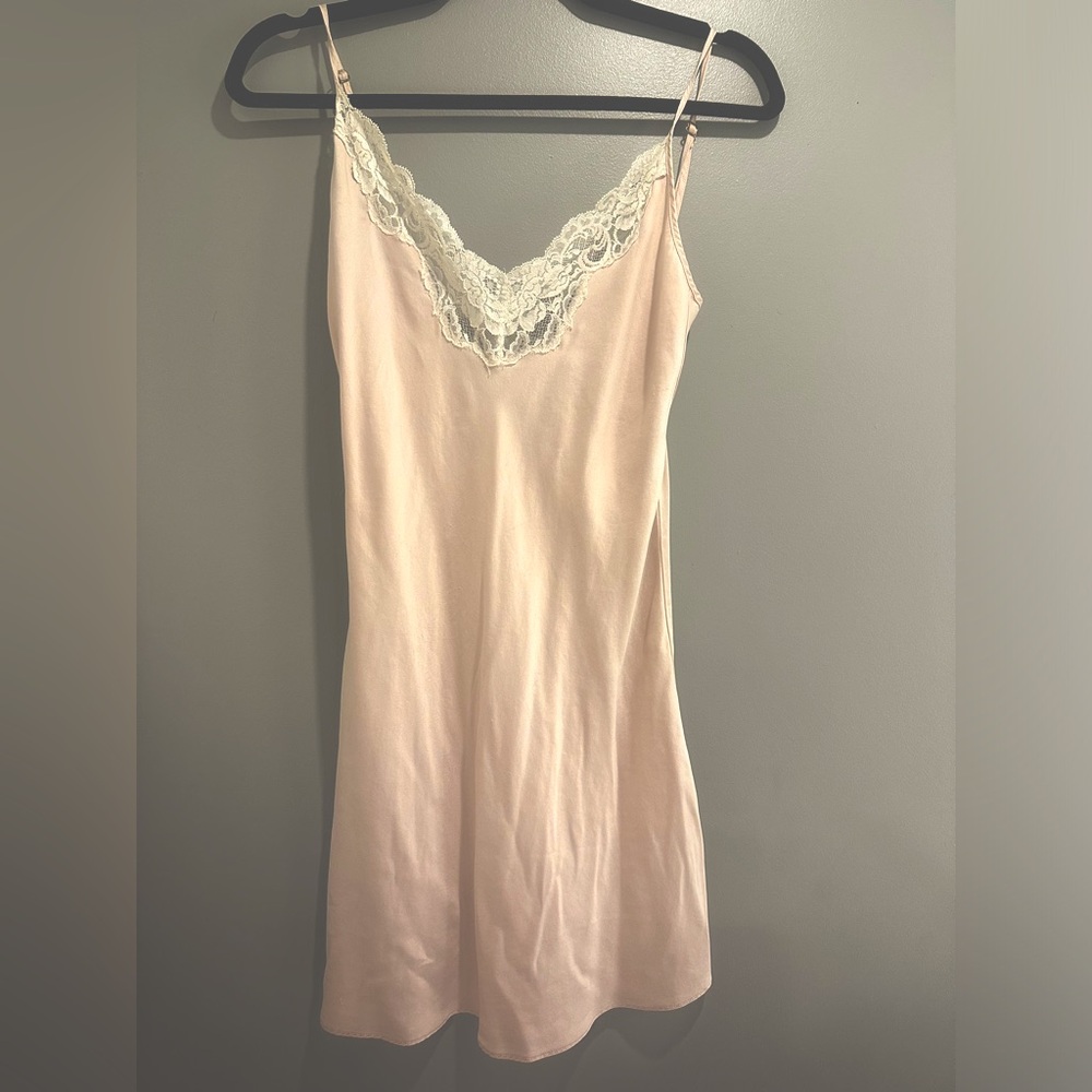 Sz S Christine’s light peach 100% silk slip made in Vancouver. Tiny flaws.